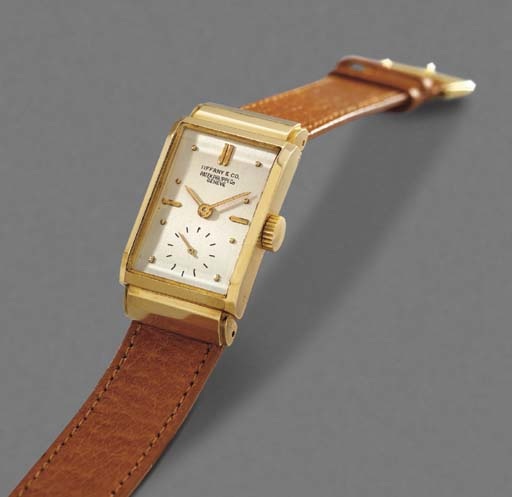 Patek Philippe. A fine and rare 18K gold rectangular wristwatch with hooded lugs