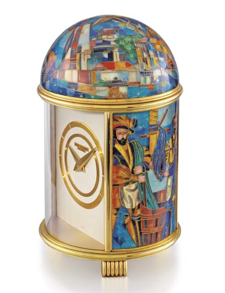 Patek Philippe. A fine and unique gilt brass and enamel solar-powered table clock