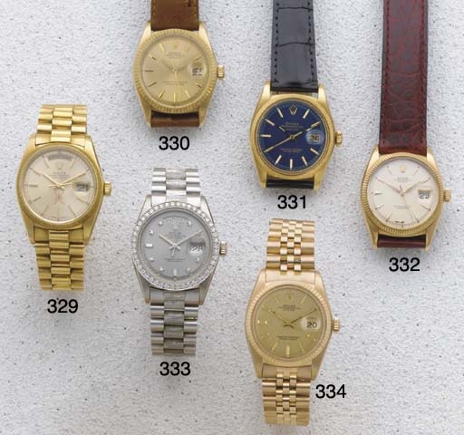 Rolex: An 18ct gold automatic centre seconds calendar bracelet watch