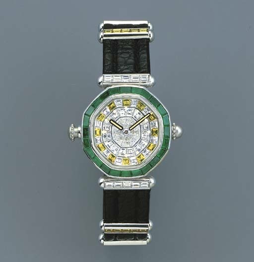 GERALD GENTA. A FINE AND VERY RARE PLATINUM, EMERALD, DIAMOND AND YELLOW DIAMOND-SET OCTAGONAL SELF-WINDING MINUTE REPEATING WRISTWATCH