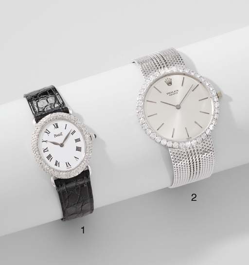 Rolex. An 18K white gold and diamond-set wristwatch with bracelet