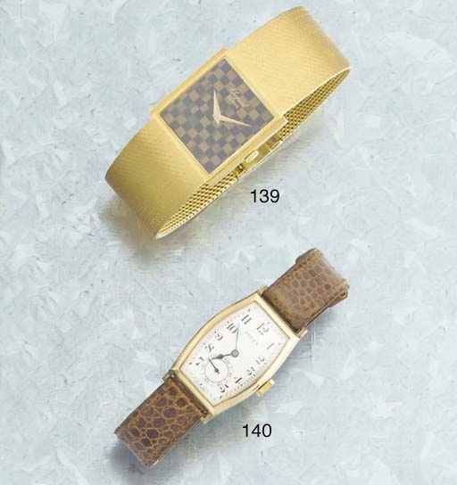 Rolex. An 9ct Gold Tonneau Cased Wristwatch
