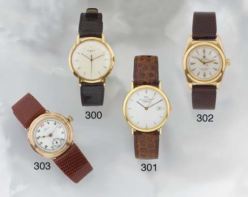 International Watch Co. An 18ct Gold Centre Seconds Calendar Wristwatch