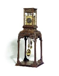A Japanese carved mulberry wood and brass double foliot dai-dokei with alarm