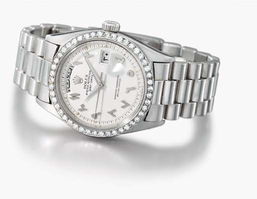 Rolex. A fine platinum and diamond-set self-winding waterproof calendar wristwatch with sweep centre seconds and bracelet, made for the Middle Eastern Market