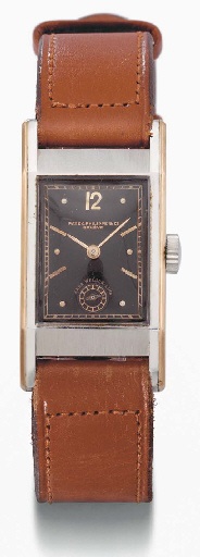 Patek Philippe. A very fine and unusual stainless steel and 18K pink gold rectangular wristwatch with black dial