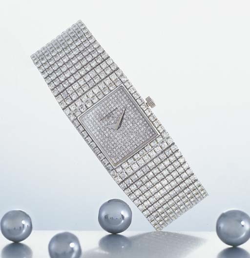 VACHERON CONSTANTIN. A FINE 18K WHITE GOLD AND DIAMOND-SET RECTANGULAR WRISTWATCH WITH BRACELET