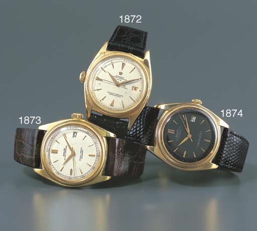ROLEX. A RARE 18K GOLD LEFT-HANDED SELF-WINDING WRISTWATCH WITH SWEEP CENTRE SECONDS AND DATE