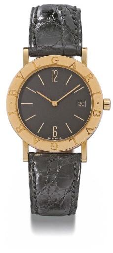 Bulgari. An 18K gold wristwatch with date