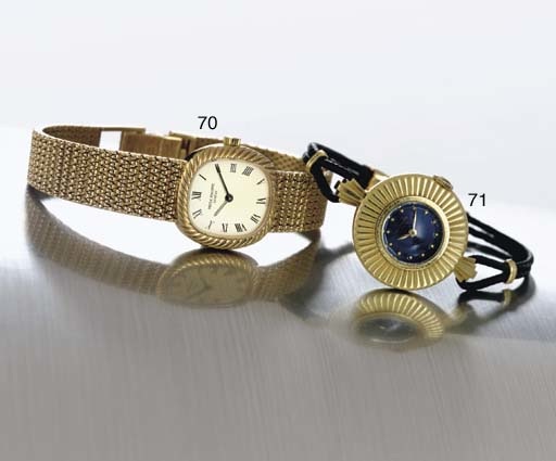 PATEK PHILIPPE. A LADY'S 18K GOLD OVAL BRACELET WATCH