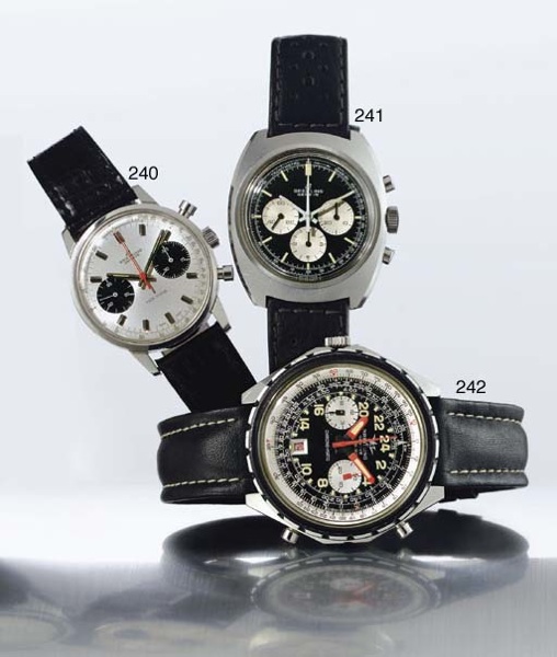 BREITLING. A LARGE OCTAGONAL STAINLESS STEEL AUTOMATIC CHRONOGRAPH WRISTWATCH WITH DATE, 24 HOURS AND SLIDE-RULE