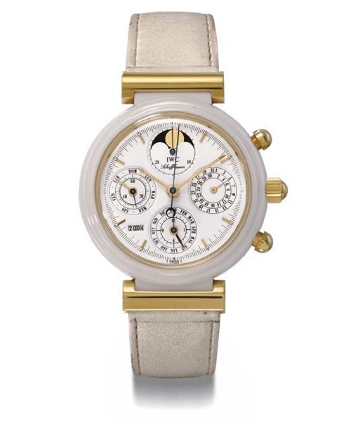 IWC. An unusual 18K gold and white ceramic self-winding perpetual calendar chronograph wristwatch with phases of the moon and year indicator