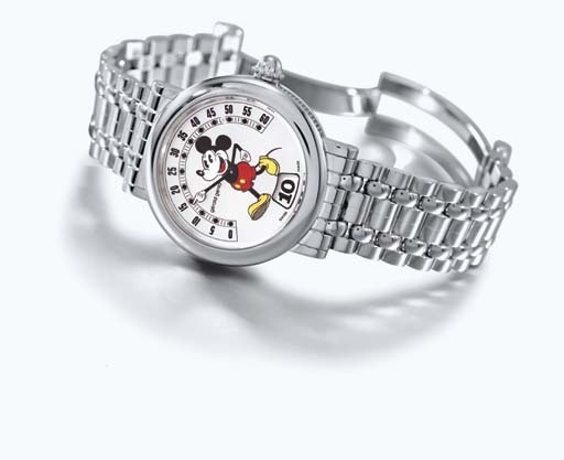 Gerald Genta. An unusual 18K white gold self-winding retrograde jump hour Mickey Mouse wristwatch with mother-of-pearl dial and bracelet