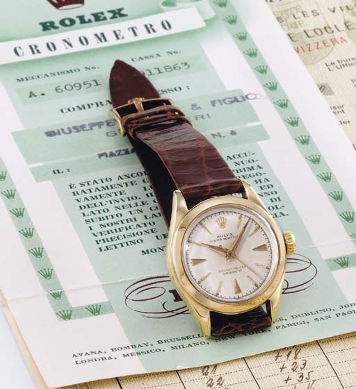 Rolex. A lady's unusual and rare 18K gold self-winding wristwatch with sweep centre seconds, original certificates and box