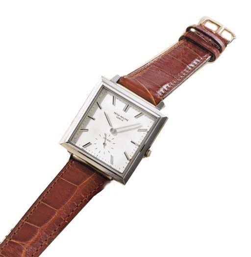 Patek Philippe. A very fine and rare 18K white gold self-winding square wristwatch