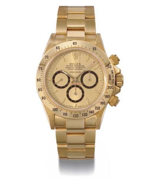 Rolex. A fine 18K gold chronograph wristwatch with bracelet