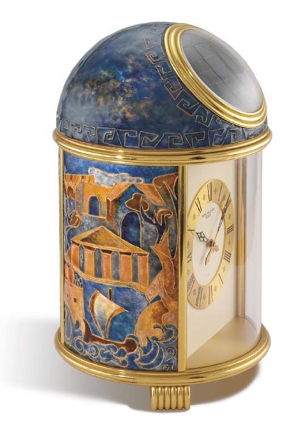 Patek Philippe. A very fine and unique gilt brass solar-powered table clock with cloisonne enamel by Elisabeth Perusset Lagger and original certificate