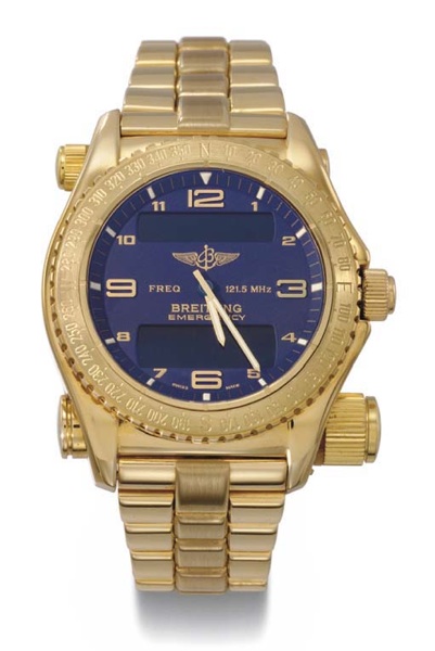 Breitling. A rare and unusual 18K gold multi-functional wristwatch with emergency transmitter, digital display for alarm, day, date, chronograph, countdown timer, world time and second time zone, micro antenna and bracelet