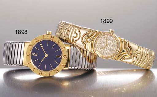 BULGARI. AN 18K GOLD AND STAINLESS STEEL BANGLE-WATCH