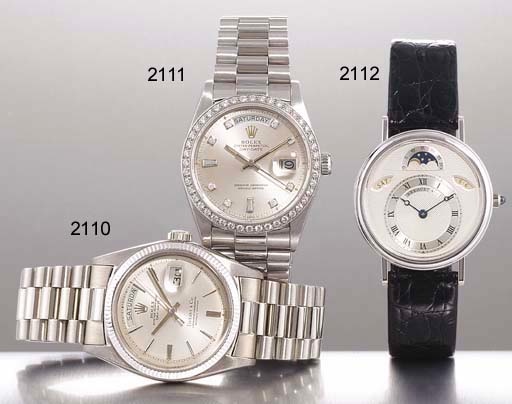 ROLEX. A PLATINUM AND LATER DIAMOND-SET AUTOMATIC WRISTWATCH WITH SWEEP CENTRE SECONDS, DAY, DATE AND BRACELET