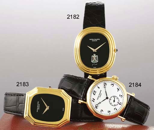 PATEK PHILIPPE. AN 18K GOLD OVAL AUTOMATIC WRISTWATCH