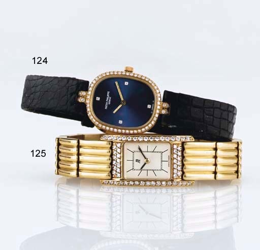 PATEK PHILIPPE. A LADY'S 18K GOLD AND DIAMOND OVAL WRISTWATCH