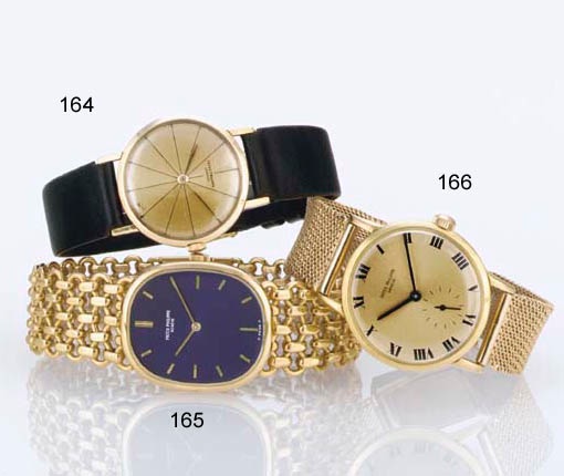 PATEK PHILIPPE. AN 18K GOLD WRISTWATCH