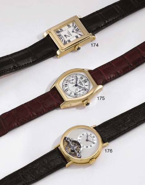Cartier. A fine and large 18K gold rectangular two time zone wristwatch