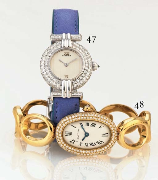 CARTIER. A LADY'S 18K WHITE GOLD AND DIAMOND WRISTWATCH