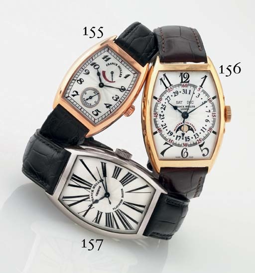 FRANCK MULLER. AN 18K WHITE GOLD TONNEAU AUTOMATIC WRISTWATCH WITH CENTER SECONDS
