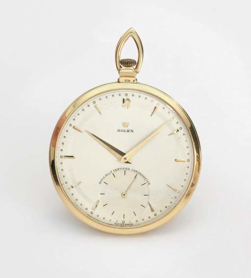 Rolex. An 18K gold openface keyless lever dress watch with two-tone silvered dial