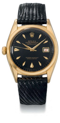 Rolex. An unusual and rare 18K gold self-winding water-resistant left-handed wristwatch with sweep centre seconds, date and black dial