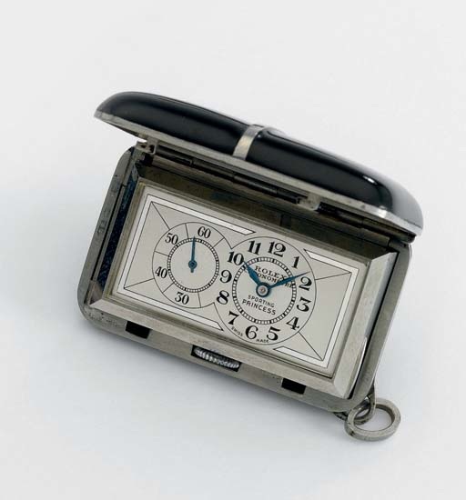 Rolex. A rare chrome and black lacquer purse watch