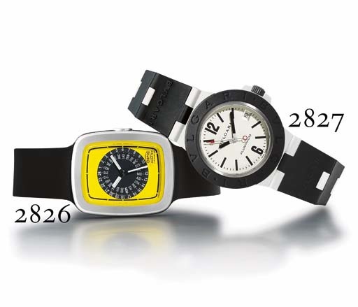 BULGARI. AN ALUMINIUM AND RUBBER AUTOMATIC WRISTWATCH WITH CENTRE SECONDS AND DATE