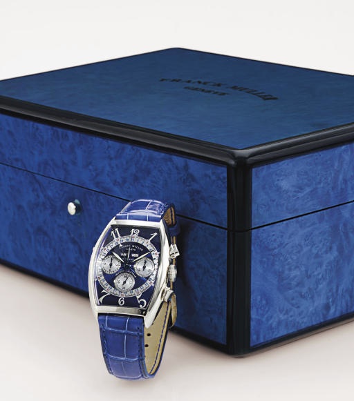 FRANCK MULLER. AN OVERSIZED 18K WHITE GOLD TONNEAU AUTOMATIC TRIPLE CALENDAR CHRONOGRAPH WRISTWATCH