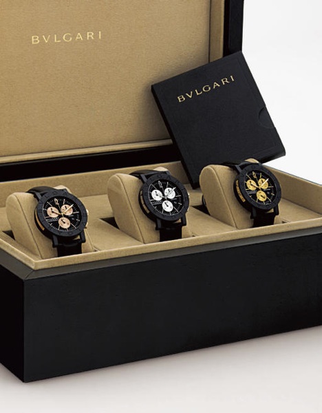 BULGARI. A SET OF THREE LIMITED EDITION PLASTIC CHRONOGRAPH WRISTWATCHES WITH DATE