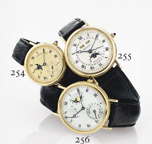 BREGUET. AN 18K GOLD WRISTWATCH WITH MOON PHASES