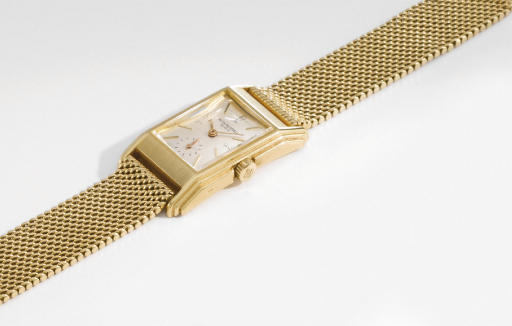 Patek Philippe. A fine and rare 18K gold rectangular curved wristwatch with stepped sides and Gay Freres bracelet