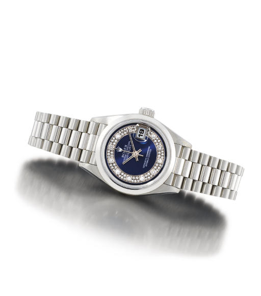 ROLEX. A FINE AND RARE LADY'S PLATINUM AND DIAMOND-SET AUTOMATIC WRISTWATCH WITH BRACELET AND DATE