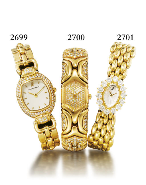 BULGARI. A LADY'S 18K GOLD AND DIAMOND-SET HEXAGONAL BANGLE WRISTWATCH