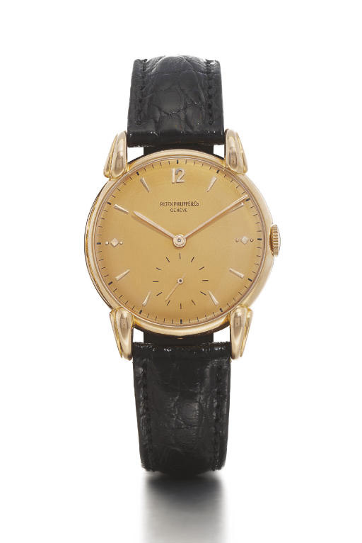 PATEK PHILIPPE. A FINE 18K PINK GOLD WRISTWATCH WITH FANCY LUGS AND PINK DIAL