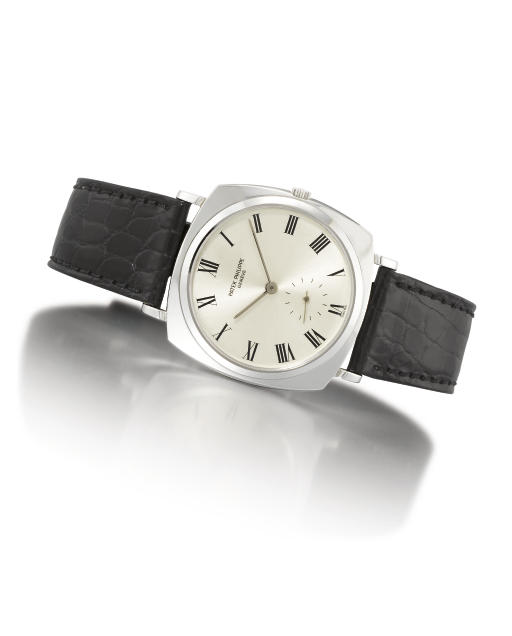 PATEK PHILIPPE. A FINE AND RARE 18K WHITE GOLD CUSHION-SHAPED AUTOMATIC WRISTWATCH