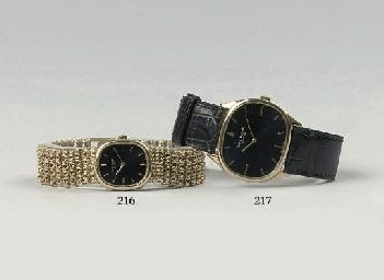 AN 18K GOLD OVAL WRISTWATCH, BY PATEK PHILIPPE