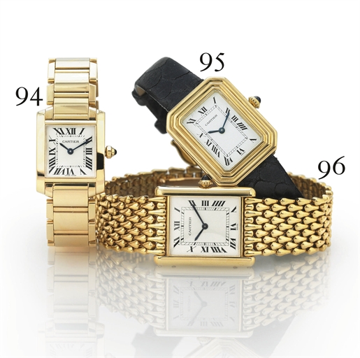 CARTIER. AN 18K GOLD RECANTULAR WRISTWATCH WITH BRACELET