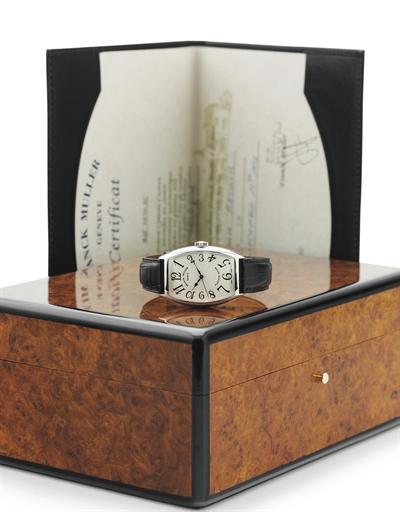 FRANCK MULLER. A FINE AND RARE PLATINUM TONNEAU AUTOMATIC WRISTWATCH WITH CENTER SECONDS