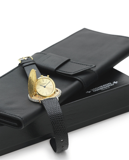 VACHERON CONSTANTIN. A FINE AND RARE 18K TWO-COLOR GOLD, DIAMOND AND RUBY COIN WRISTWATCH