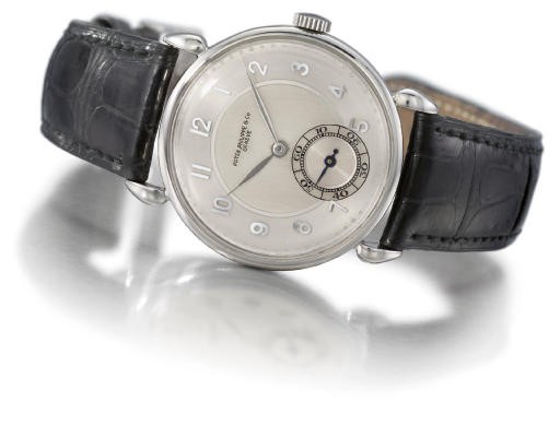 Patek Philippe. A fine, rare and very attractive stainless steel wristwatch with teardrop lugs and two-tone silvered dial