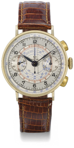 Omega. A large and attractive 14K gold chronograph wristwatch with two-tone silvered dial