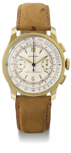 Longines. A fine and attractive 18K gold chronograph wristwatch