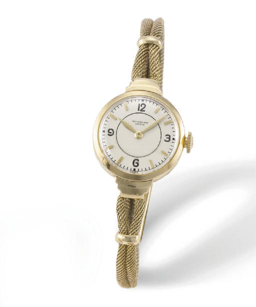 Patek Philippe. A lady's rare and unusual 18K gold wristwatch